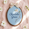 Custom Name Floral Hoop with Linen Bow: Hand-Embroidered Baby Name Sign