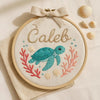 Hand-Embroidered Baby Name Hoop with Sea Turtle: Personalized Nursery Decor with Linen Bow