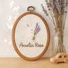 Embroidered Baby Name Sign: Floral Nursery Decor with Linen Bow