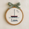 Hand-Embroidered Sailboat Name Hoop: Personalized Baby Name Wall Art with Linen Bow