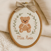 Hand-Embroidered Teddy Name Sign: Custom Oval Hoop for Nursery Decor
