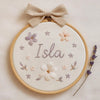Hand-Embroidered Name Hoop with Linen Bow: Custom Baby Gift & Nursery Décor