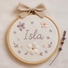 Hand-Embroidered Name Hoop with Linen Bow: Custom Baby Gift & Nursery Décor